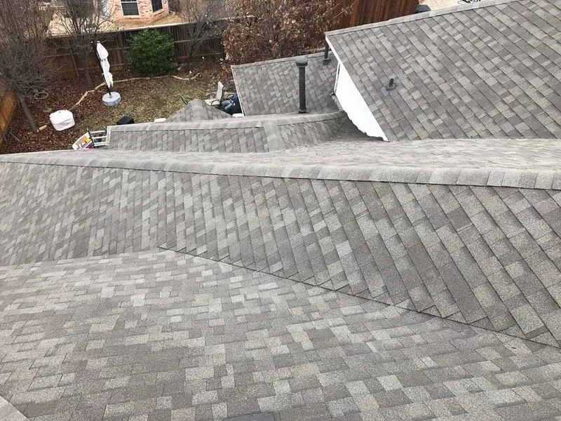 Close-up of new shingles installed by Dimensional Pro Construction
