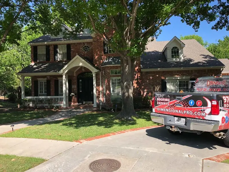 A finished roof replacement by Dimensional Pro Construction