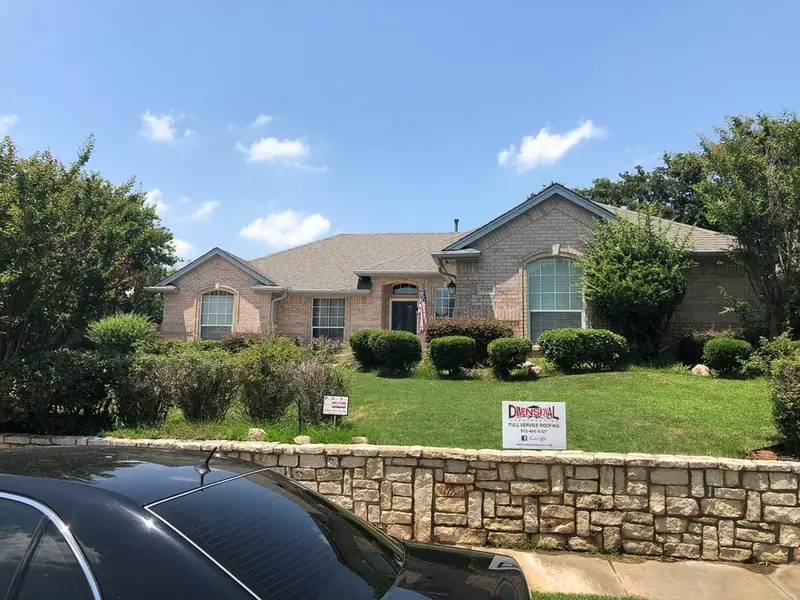 A finished roof replacement by Dimensional Pro Construction