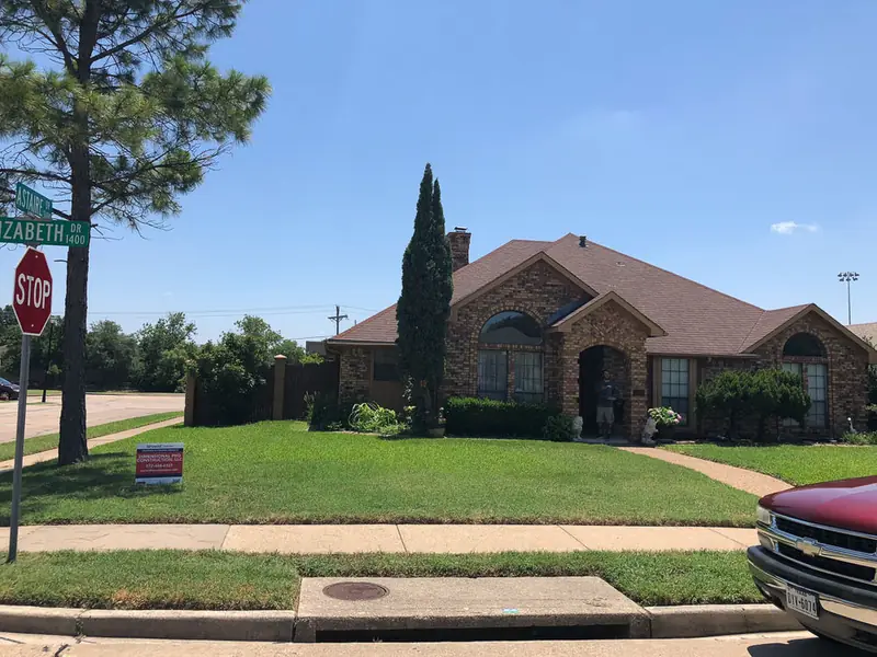 A finished roof replacement by Dimensional Pro Construction