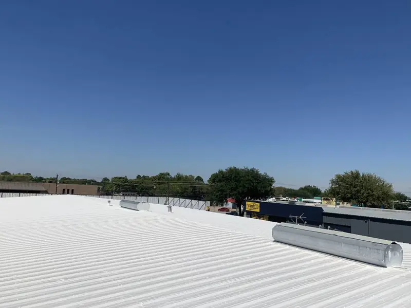 A commercial roof restored by Dimensional Pro Construction