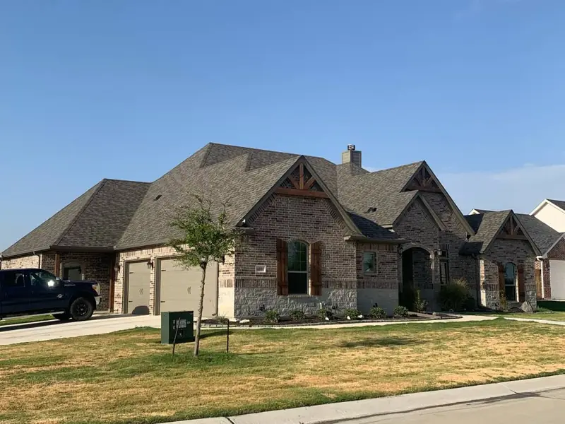 A finished roof replacement by Dimensional Pro Construction