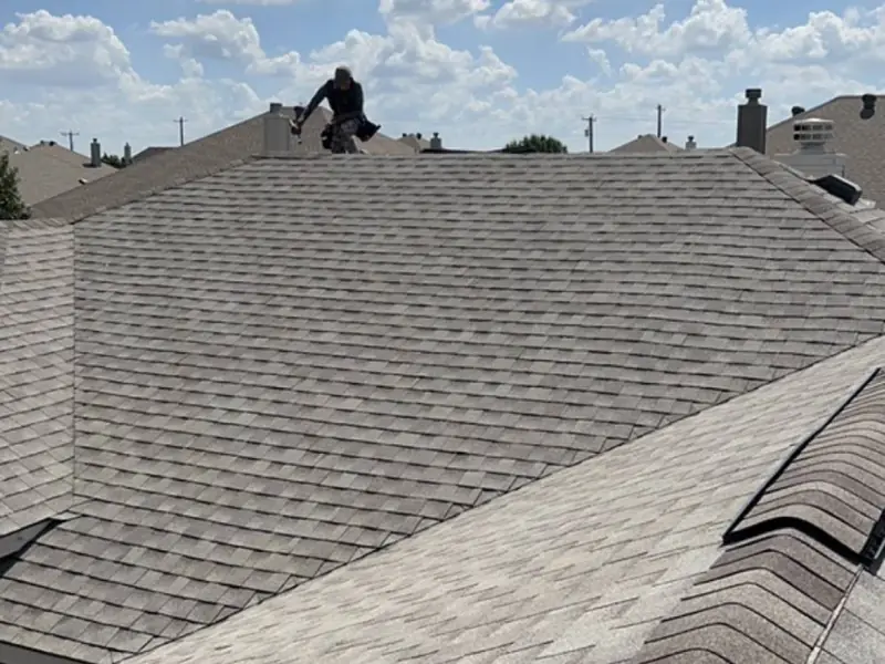 Close-up of new shingles installed by Dimensional Pro Construction