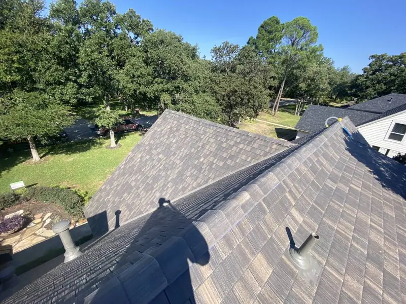 Close-up of new shingles installed by Dimensional Pro Construction