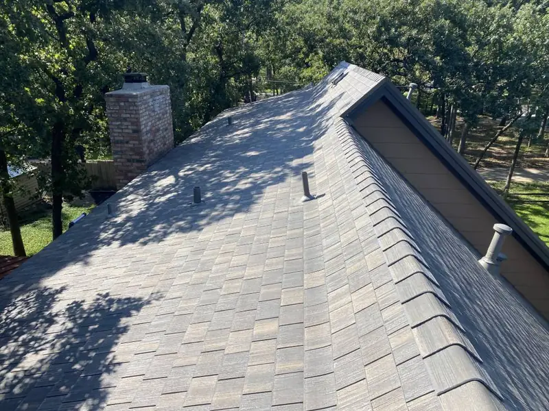 Close-up of new shingles installed by Dimensional Pro Construction