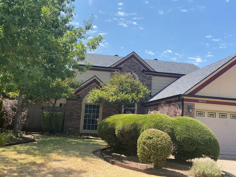 A finished roof replacement by Dimensional Pro Construction