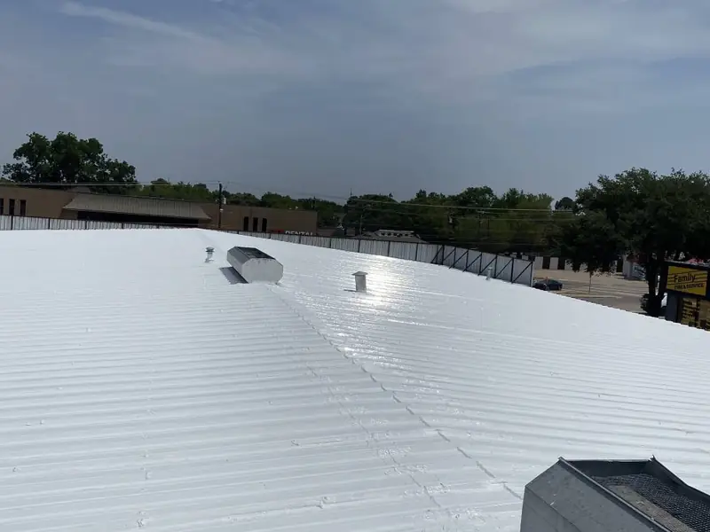 A commercial roof restored by Dimensional Pro Construction