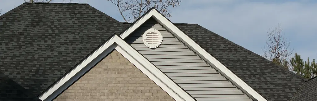 Roofline against a North Texas sky